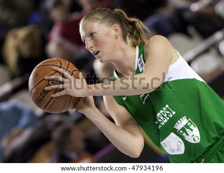 CLUJ-NAPOCA, ROMANIA - MARCH 3: Woman basketball player in action at a Romanian National Championship basketball game U Mobitelco vs LMK Sf. Gheorghe March 3, 2010 in Cluj-Napoca, Romania.