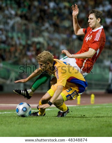 BUDAPEST, HUNGARY - AUGUST 12: Soccer players in action at a friendly soccer match between Hungarian National Team and Romanian National Team on august 12, 2009, Budapest, Hungary.