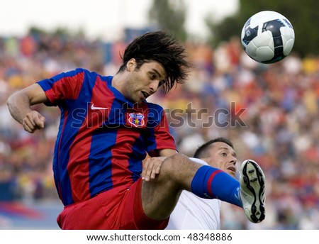 BUCHAREST, ROMANIA - JULY 16: Soccer players in action at a European League qualification match between Steaua Bucuresti and Ujpest Budapest on july 16, 2009, Bucharest, Romania.