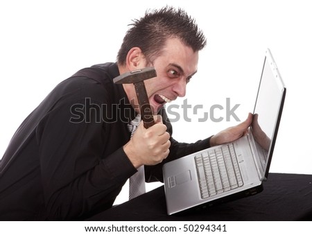 image: stock-photo-businessman-destroying-his-pc-with-a-hammer-50294341