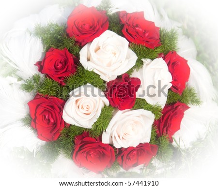 Wedding flowers of white calla lillies and red roses