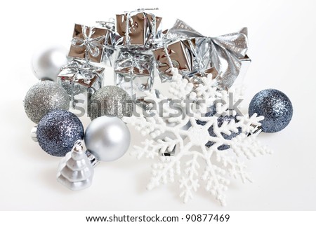 Winter holiday background with silver ornaments