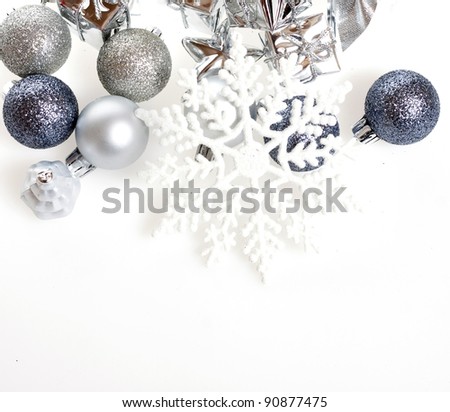 Winter holiday background with silver ornaments