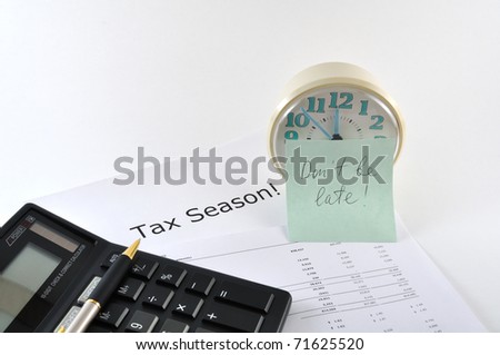 Tax Season. Don`t be late. Concept Image with calculator and clock