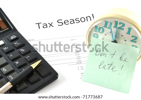 Concept Image with calculator and clock. Tax Season! Don`t be late!