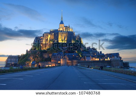 Sunset in Mont Saint Michel.This photo was taken on 26th of june of 2012.Mont Saint Michel is in the lower Normandy on the west coast of France.It is world heritage.Abbey was built on 13th century.