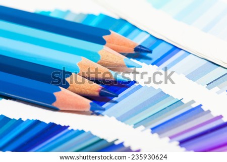 blue colored pencils and color chart of all colors