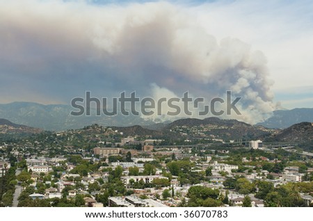 LOS ANGELES - AUGUST 28: The Angeles Crest forest fire sends up clouds of smoke on August 28, 2009, in Los Angeles, California.