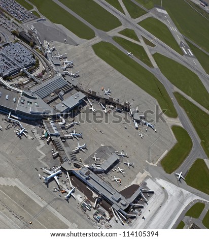 Airport - taxiways, runways, airport terminals, aircrafts, airplanes, planes and lounges in Vancouver, British Columbia, Canada