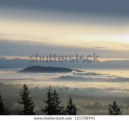 Vancouver, SFU, Burnaby Mountains, Richmond and Vancouver Island Mountains in the clouds