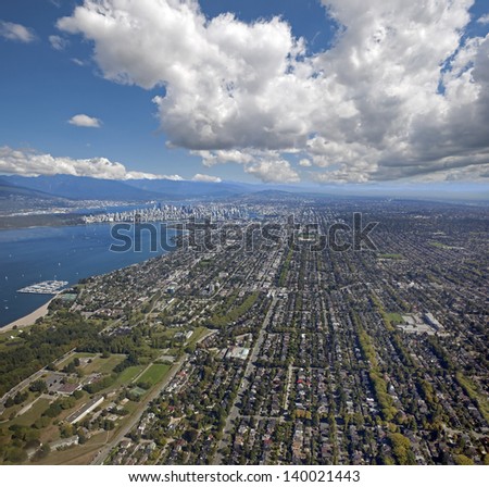 Vancouver - Metro Vancouver with Kitsilano, English Bay, downtown, Stanley Park and Coast Mountains