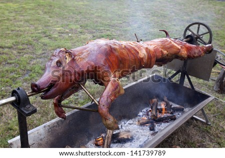Pork meat - pig grilled traditional outside of restaurant