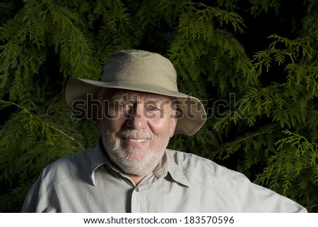 Senior farmer - happy older man with a hat
