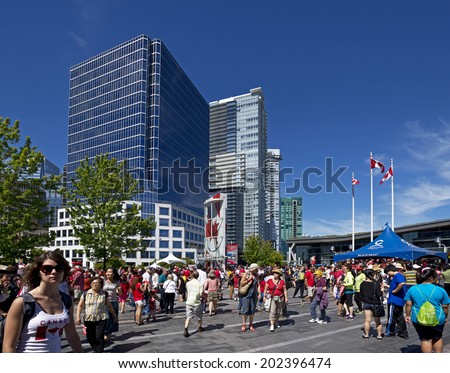 VANCOUVER CANADA DAY - JULY 1, 2014: Celebration of the National Day is provided across country, also in Vancouver.Three colonies were united in 1867 under Constitution Act into a single country called Canada
