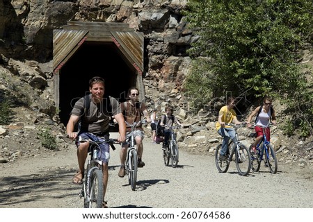 MYRA CANYON - AUGUST 13, 2008: Trestles and tunnels by Myra Canyon by Kelowna are popular to cyclists, hikers and also older pedestrians. Wonderful trails with trestles are on the slopes of the canyon