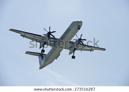 JAZZ AIR - MAY 31, 2014: Air Canada EXPRESS is also named as Air Canada JAZZ or Jazz Air. 2 Turboprop engine aircraft DASH 8-MSN 4381 lands in Vancouver International Airport. British Columbia Canada