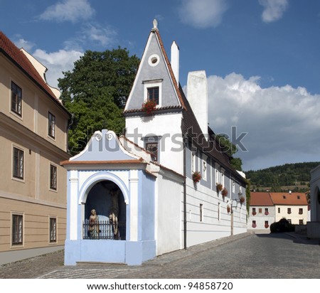 Ceský Krumlov - historic houses with a chapel