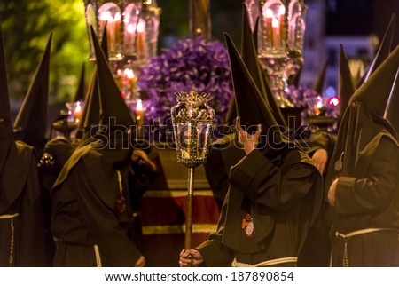 VALLADOLID, SPAIN -Â?Â? APRIL 17, 2014: Black nazarenos in the religious processions during Holy Week on Good Thursday Night, on April 17, 2014 in Valladolid, Spain.