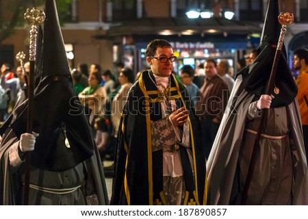 VALLADOLID, SPAIN -Â?Â? APRIL 17, 2014: People in the religious processions during Holy Week on Good Thursday Night, on April 17, 2014 in Valladolid, Spain.