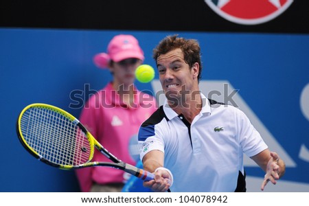 SYDNEY - JAN 12: Richard Gasquet from France plays a forehand volley in his match in the APIA Tennis International. Sydney - January 12, 2012