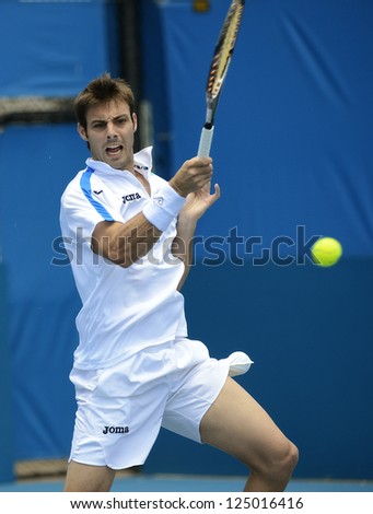 SYDNEY - JAN 9: Marcel Granollers from Spain hits a forehand at the APIA Sydney Tennis International. Sydney January 9, 2013.