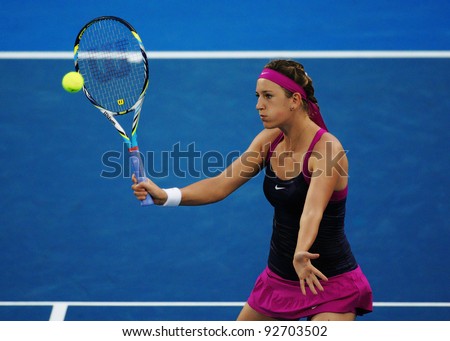SYDNEY - JAN 13: Victoria Azarenka plays a forehand volley in the final of the APIA Tennis International. Sydney - January 13, 2012