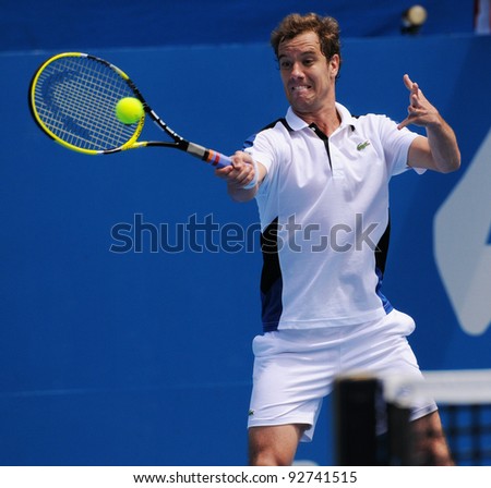 SYDNEY - JAN 12: Richard Gasquet hits a forehand in quater final match in the APIA Tennis International. Sydney - January 12, 2012