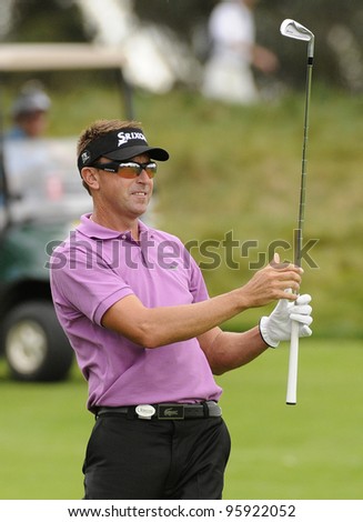 SYDNEY - NOV 10: Australian Robert Allenby plays from the fairway during his first round at the Emirates Australian Golf Open in Sydney, Australia on November 10, 2011