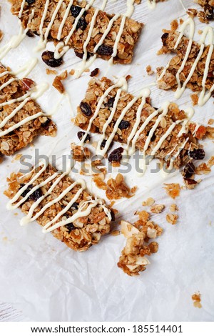 Homemade granola bars with fresh muesli and raisins