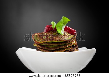 Healthy and delicious spinach pancakes with lingonberry jelly