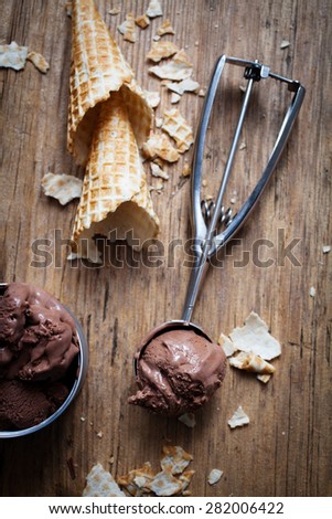 Chocolate ice cream on wooden background