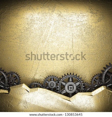 gear wheels on golden background