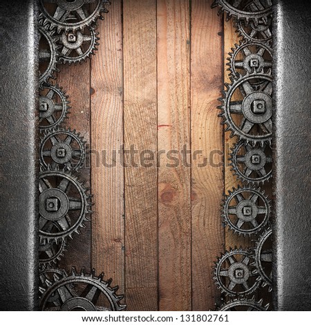 gear wheels on wooden background
