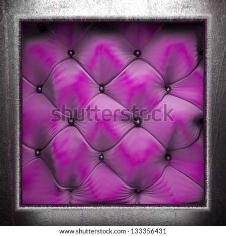 Silver element on fabric background