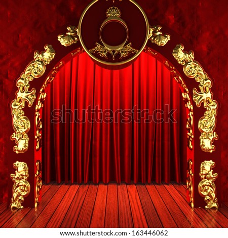 red fabric curtain with gold on stage