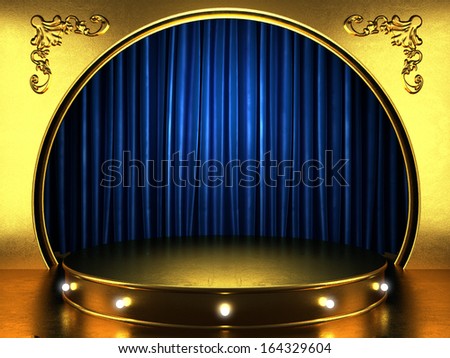 blue fabric curtain with gold on stage