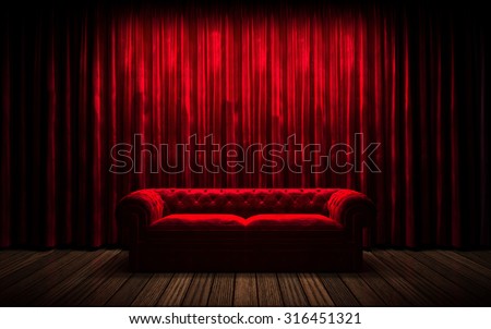red curtain stage with sofa