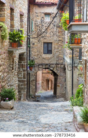 Medieval arched street in the old town of spain