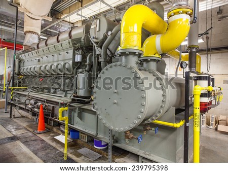 This diesel generator uses a locomotive engine as it\'s driver.   Stationary mounted in a building, hundreds of these are used on ships and oil rigs.