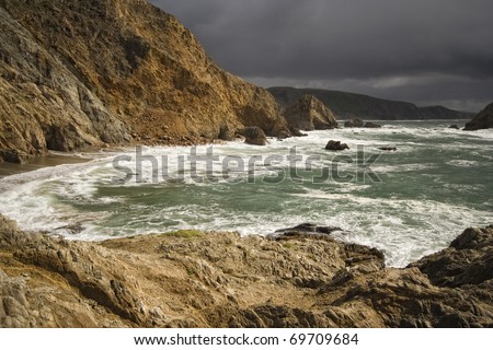 Open ocean and cliffs on the California coast.
