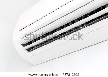 Closeup white air conditioner in room