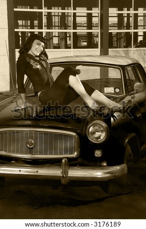 stock photo pinup style model on a 50s car