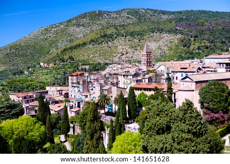 cityscape - landscape of a little italian town - rooftops and mountains in the background