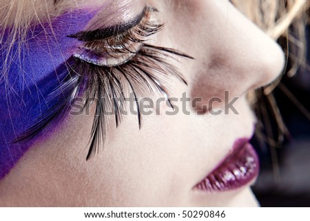 close-up of an eye with fake eyelashes and original make-up