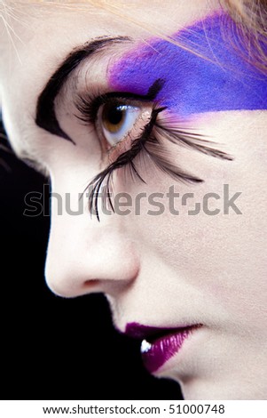 girls face with original make-up - fake eyelashes