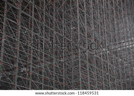 Closeup of complicated structure of the bars supporting ski ramp as a background