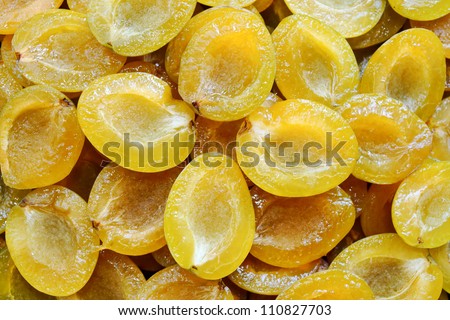 A lot of juicy yellow plums without kernels