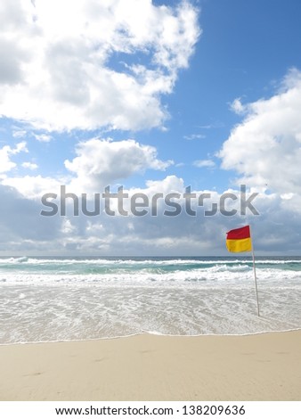 beautiful beach with a flag