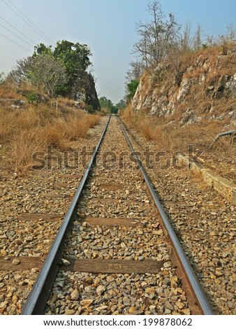 Train tracks running through the mountain.