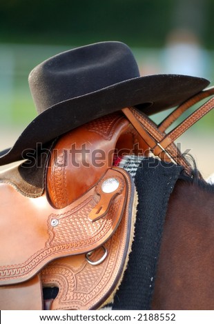 western hat on a saddle